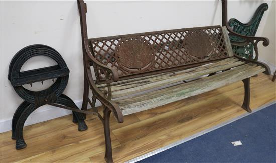 A Garden bench and a pair of bench ends W.125cm